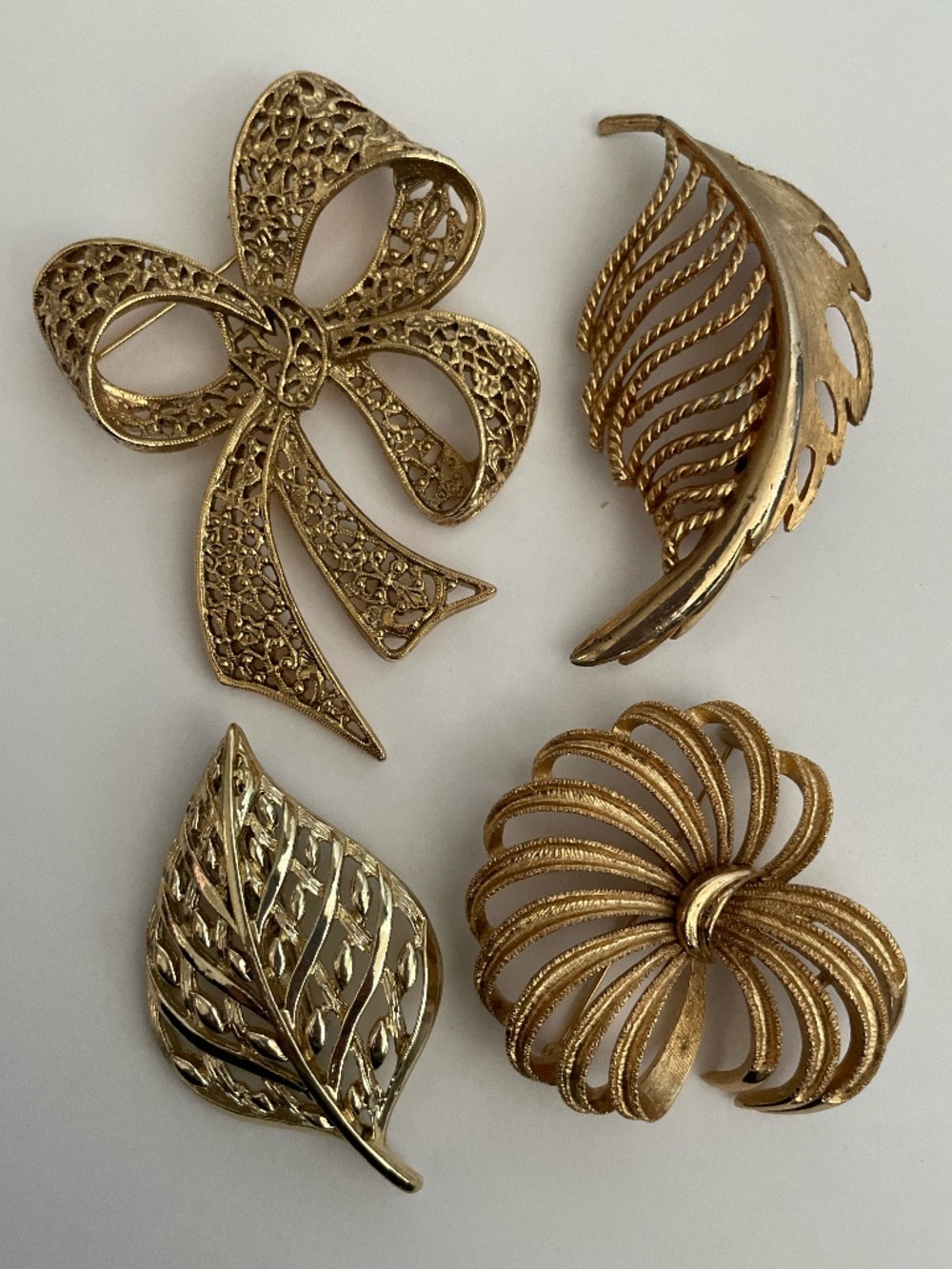 Vintage Gold-Tone Brooch Lot-Signed MONET Swirl Bow & Filigree Leaf and Bow Pins